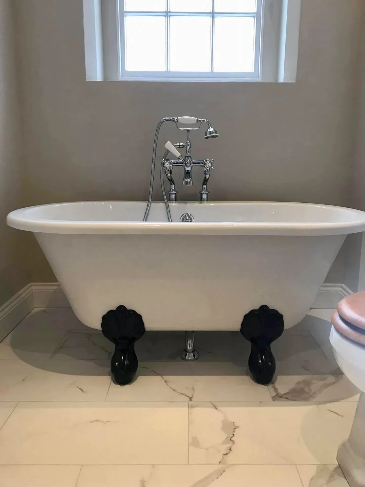 Claw-foot freestanding bath fitted by JM Bathrooms in Haywards Heath